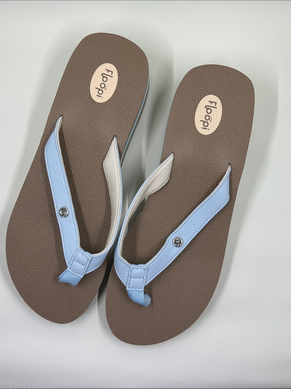 Floopi Women's Light Blue Strap Flip Flops with Brown Footbed